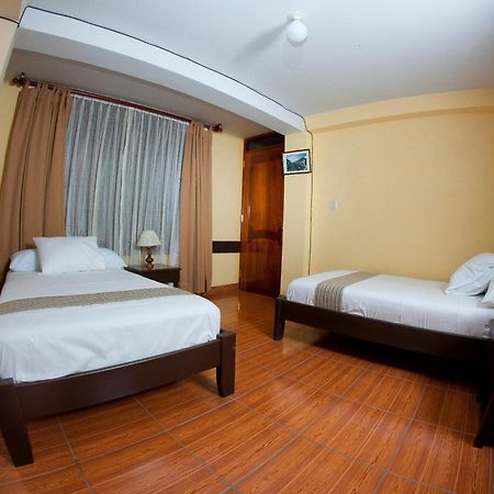 Yucay Plaza Inn Habitación foto