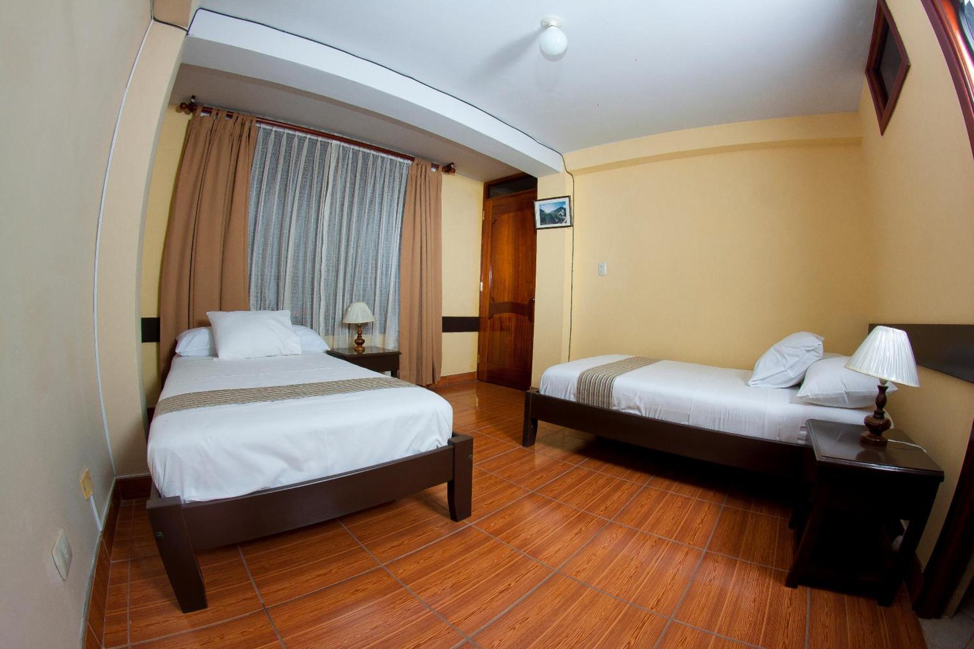 Yucay Plaza Inn Habitación foto