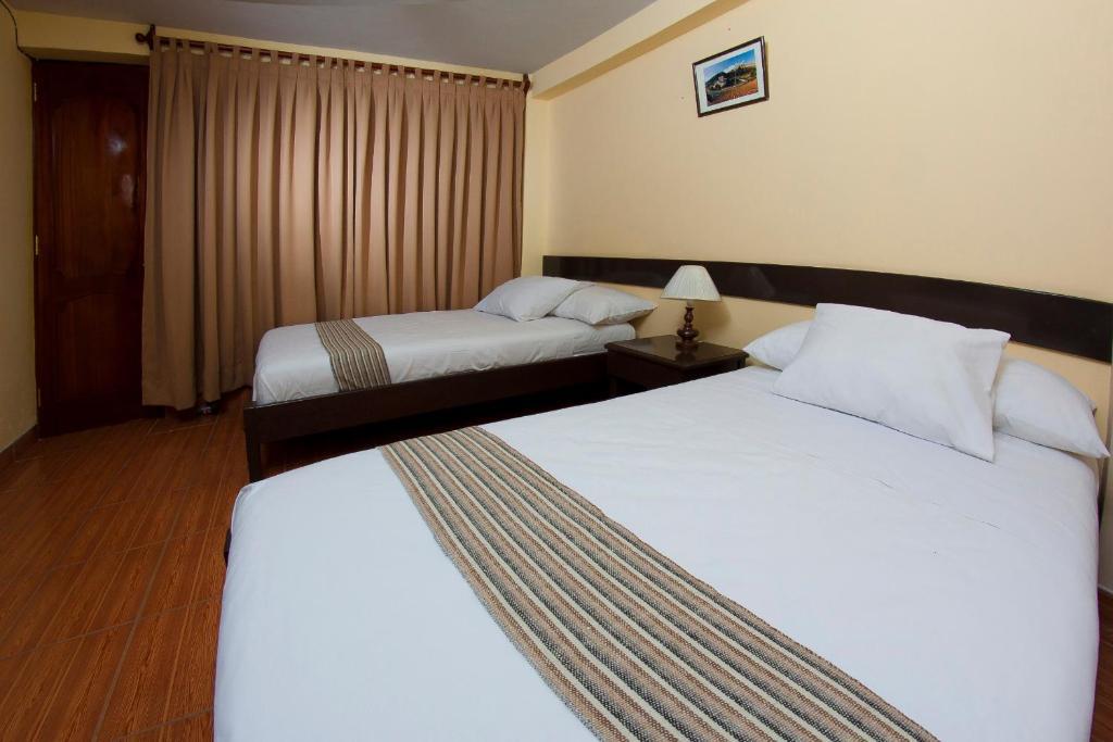 Yucay Plaza Inn Habitación foto